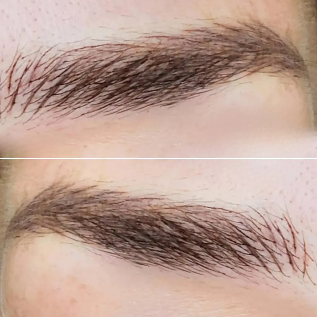 A CLOSE UP OF A PERSON'S EYEBROW